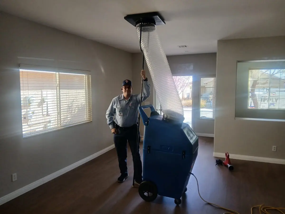 Professional Dryer Vent Cleaning work inside a Desert Hot Springs home
